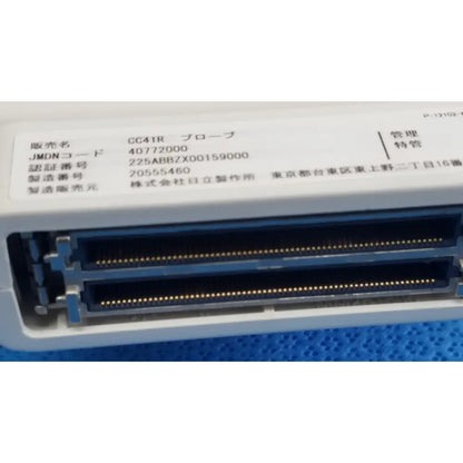 White plastic connector with two rows of gold pins on the back side of hitachi cc41r ultrasound probe labeled in japanese text
