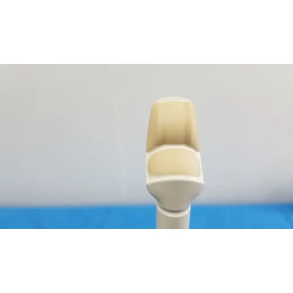 Cream-colored plastic robot finger with segmented ergonomic design for hitachi cc41r ultrasound probe 8-4 mhz