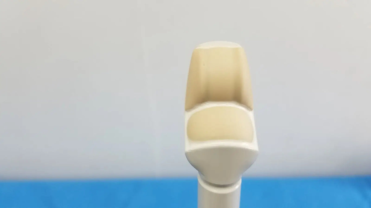 Cream-colored plastic robot finger with segmented ergonomic design for hitachi cc41r ultrasound probe 8-4 mhz