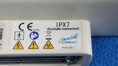 White plastic hitachi cc41r ultrasound probe labeled ce ipx7 compatible with sterrad for medical imaging use