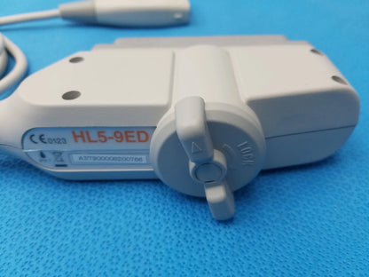 White plastic hl5-9ed linear ultrasound transducer probe with gray adjustment knob and attached cable for ultrasound imaging