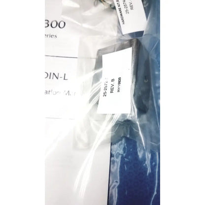 Black rectangular hoffman steel type 1 cutout box with latch hardware kit in clear plastic packaging with white labeling