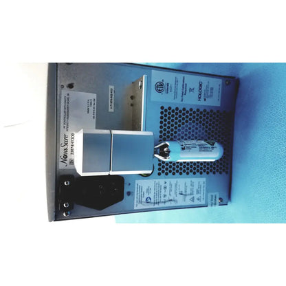 Light blue cylindrical sensor with metallic connector attached to silver and black hologic novasure model 09 rf controller unit equipment
