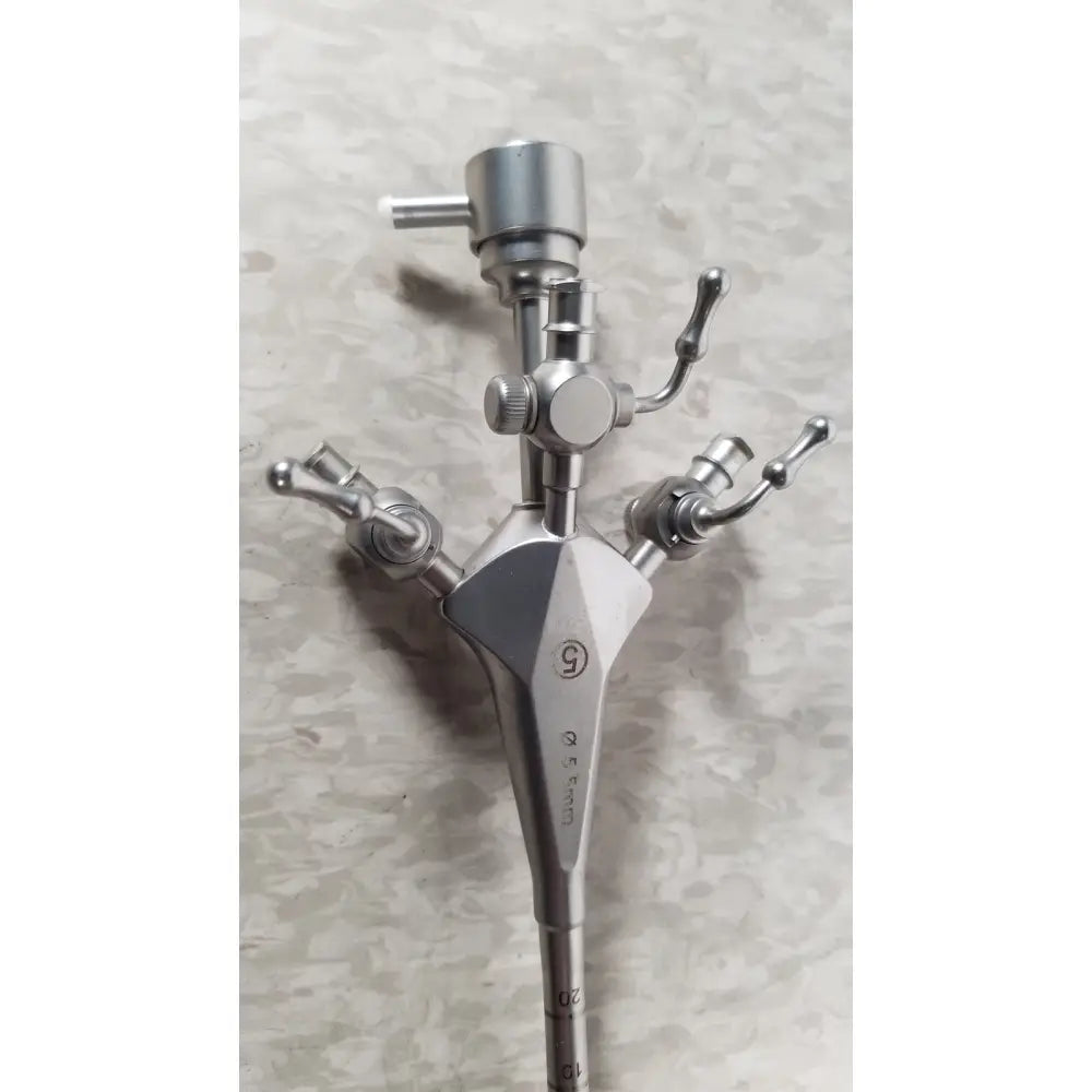 Silver surgical diagnostic sheath with multiple articulated arms engraved with 5 and brand name hologic ths-01513 operative