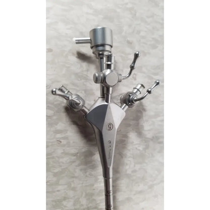 Silver surgical diagnostic sheath with multiple articulated arms engraved with 5 and brand name hologic ths-01513 operative