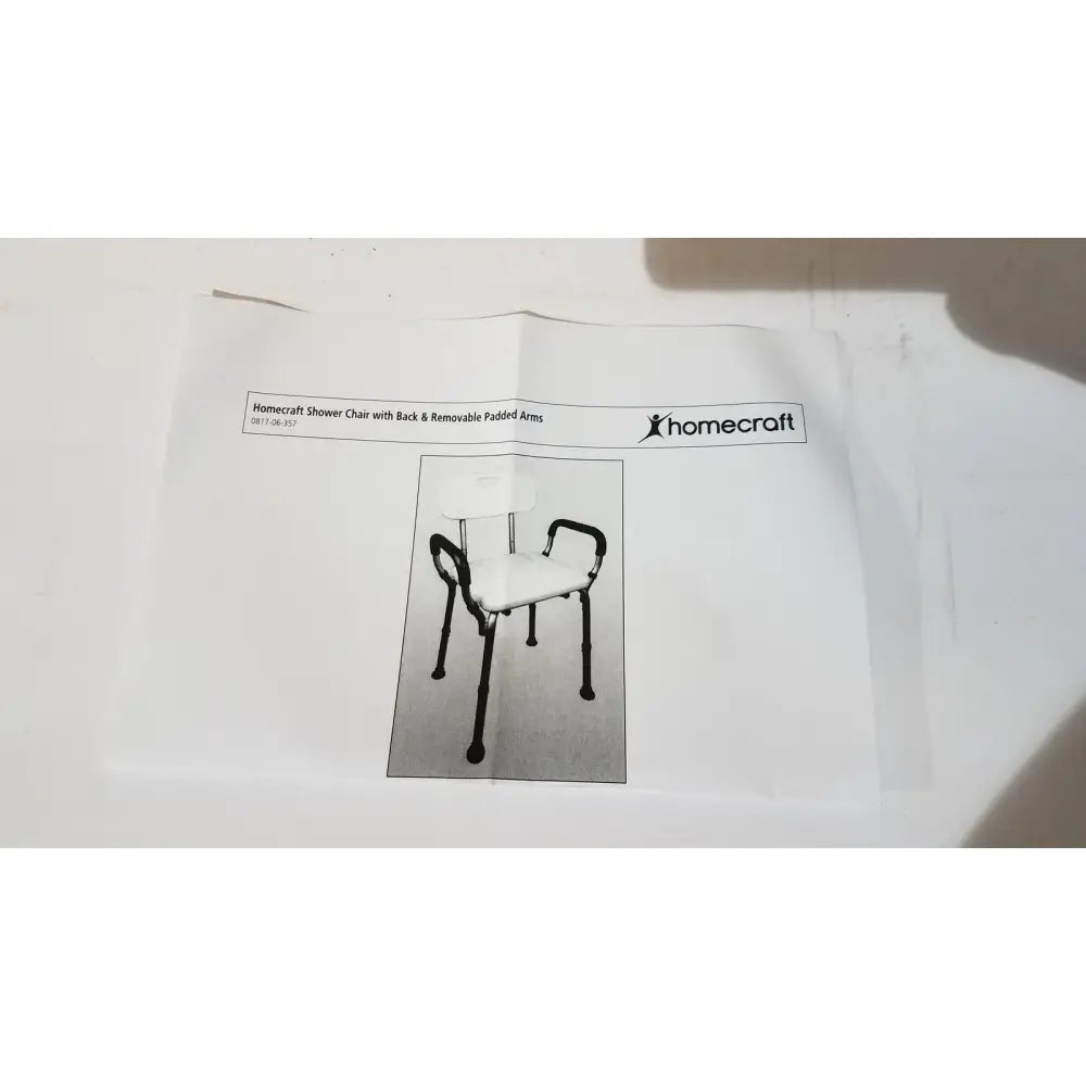 Homecraft shower chair with backrest and padded removable arms features white seat and backrest with black metal legs
