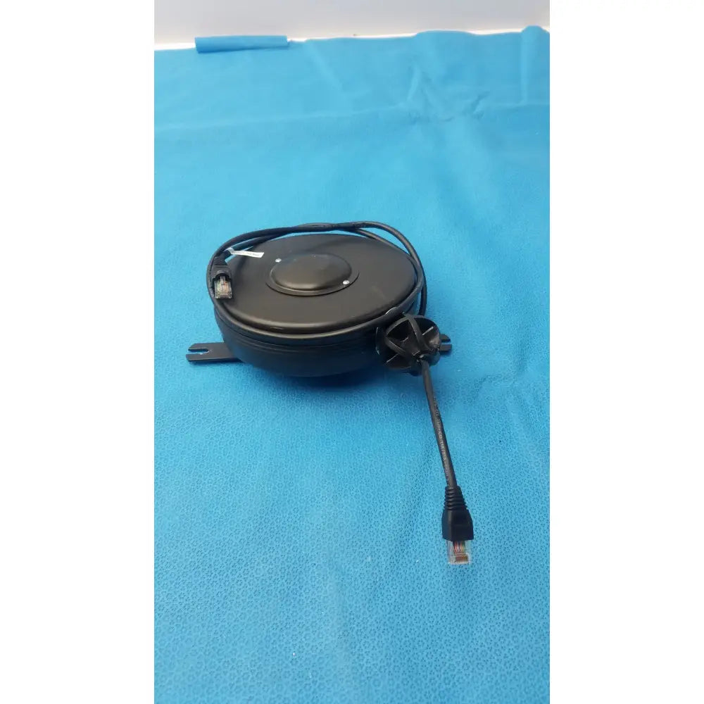 Black plastic hospital and network grade retractable cable reel with ethernet cord and rj45 connector