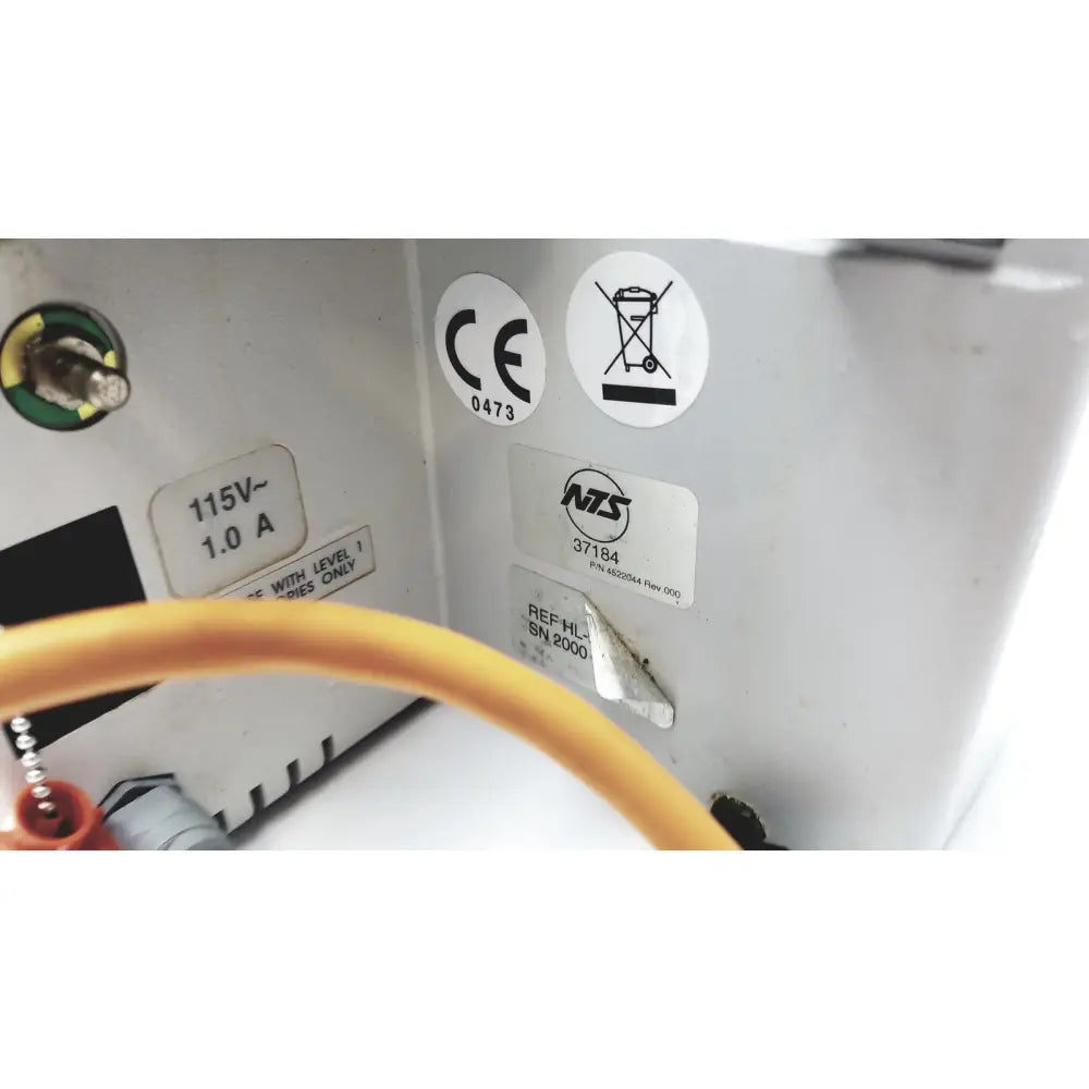 White plastic hotline hl-90 115v fluid warmer level 1 with ce nzs labels and yellow cable connected at back side
