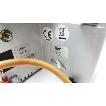 White plastic hotline hl-90 115v fluid warmer level 1 with ce nzs labels and yellow cable connected at back side