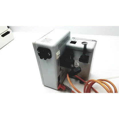 Silver metallic power supply unit with black connectors and orange cables for hotline hl-90 115v fluid warmer level 1