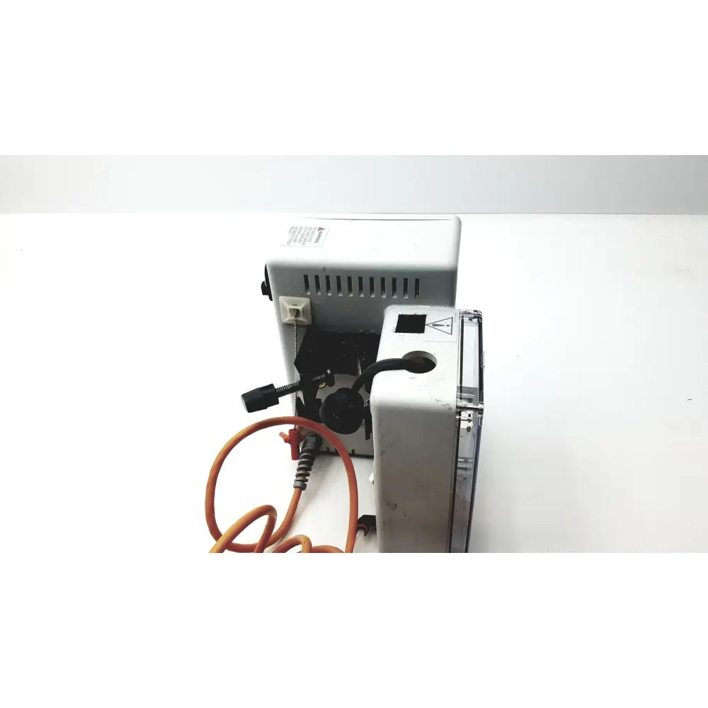 Gray plastic electric coffee grinder with black components and orange power cord for use with hotline hl-90 115v fluid warmer level 1