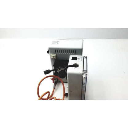 Gray plastic electric coffee grinder with black components and orange power cord for use with hotline hl-90 115v fluid warmer level 1