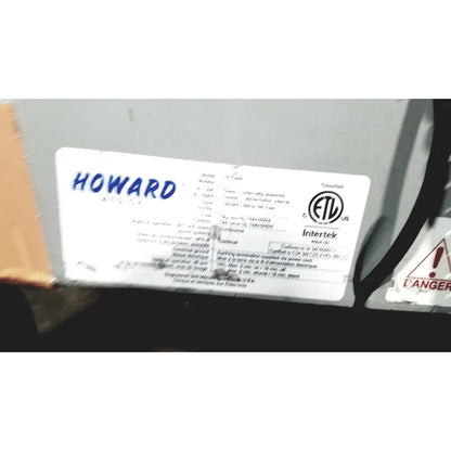White rectangular label with blue howard text and certification marks on the back of howard medical hi-care monitor