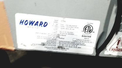 White rectangular label with blue howard text and certification marks on the back of howard medical hi-care monitor