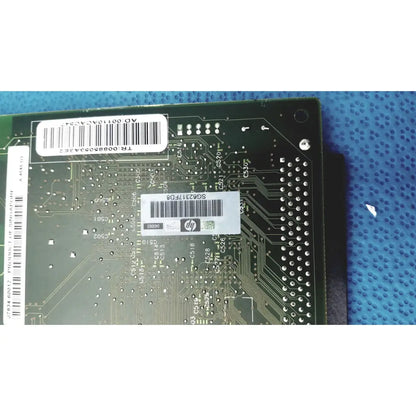 Green hp jetdirect 620n motherboard with silver circuitry and white barcode labels for fast ethernet print server use
