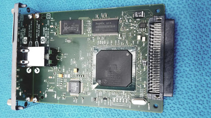 Green hp jetdirect 620n pci expansion card with black circuits and silver connectors for fast ethernet print server use