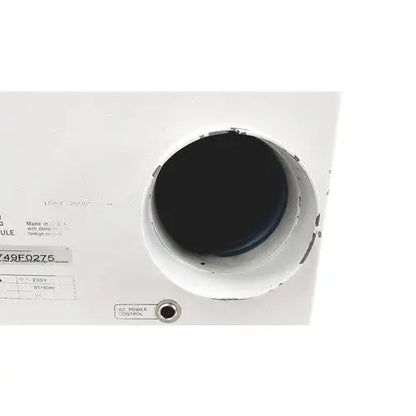 White circular speaker grille with black interior and manufacturer label on hp power module laser power output 50/60hz