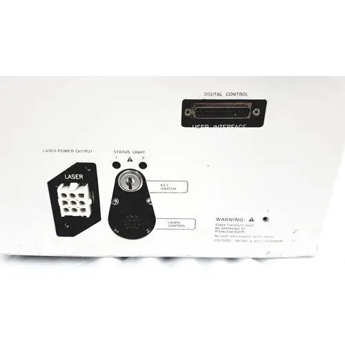 Black back side of hp power module laser power output connector with white grid pattern and labeled ports