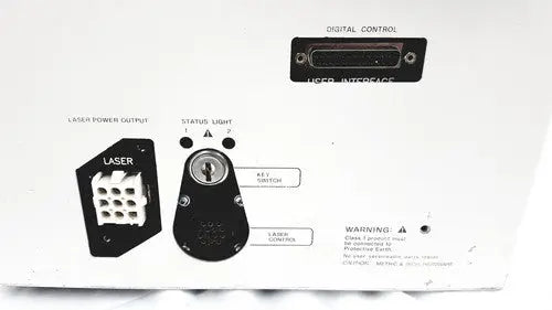 Black back side of hp power module laser power output connector with white grid pattern and labeled ports