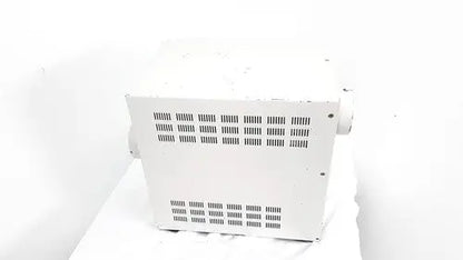 White metal industrial fan with rectangular vent grid on the back side of hp power module laser power output 50/60hz