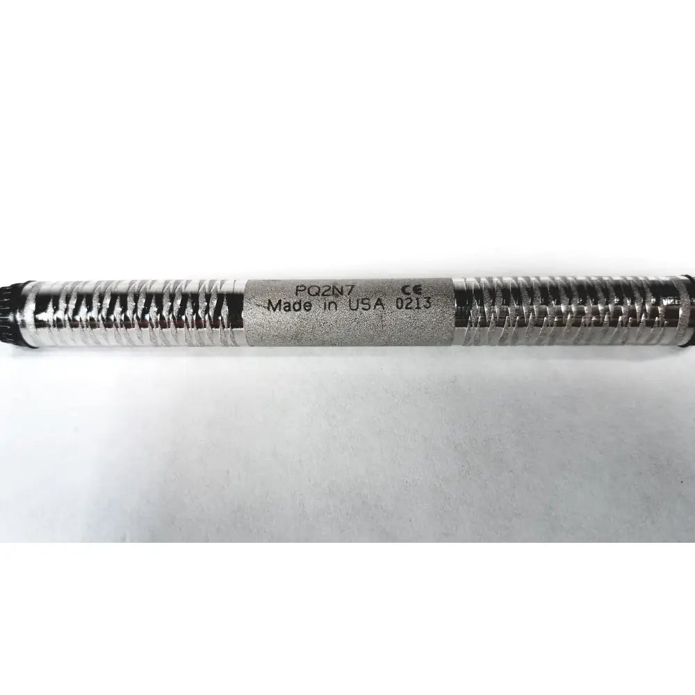 Silver metallic coiled tube with black end caps and po2n7 label for Hu-Friedy odu pq2n7 dental instrument