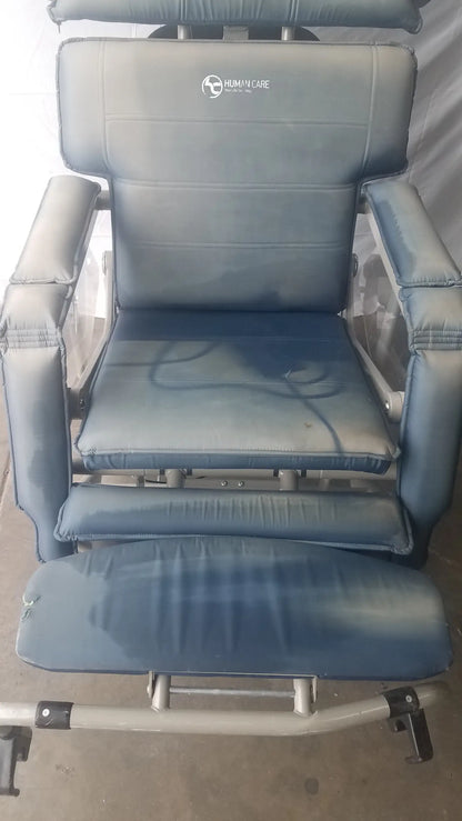 HumanCare I-400 blue upholstered hummie cage bariatric convertible chair with padded armrests and footrest