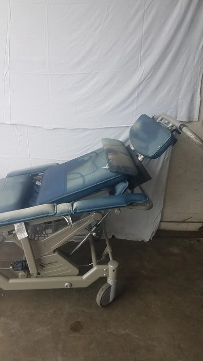 Blue padded bariatric convertible chair with adjustable sections and metal frame humanCare I-400 convertible chair