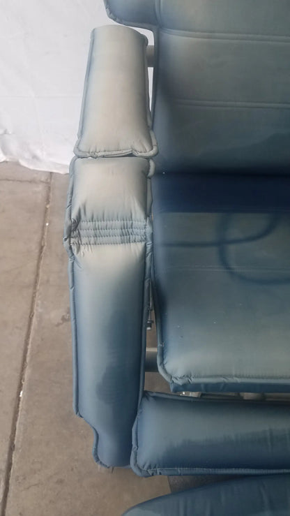 Blue padded armrest of the HumanCare I-400 bariatric convertible chair showcasing comfort and support features