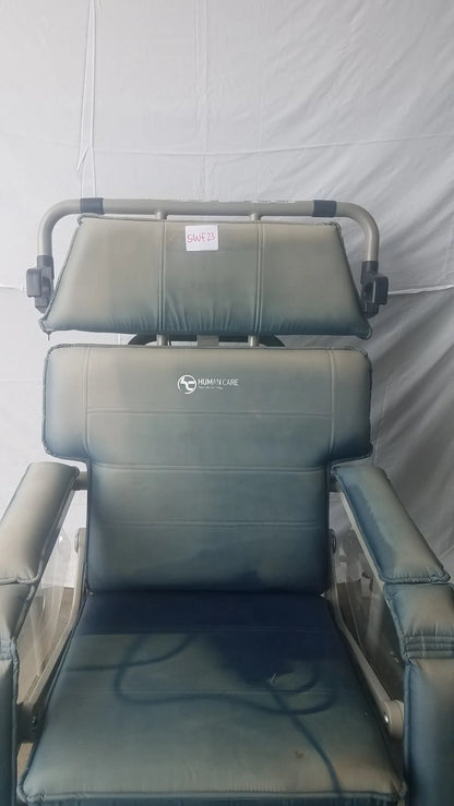 HumanCare I-400 bariatric convertible chair with gray upholstered recliner, metal frame, and headrest support