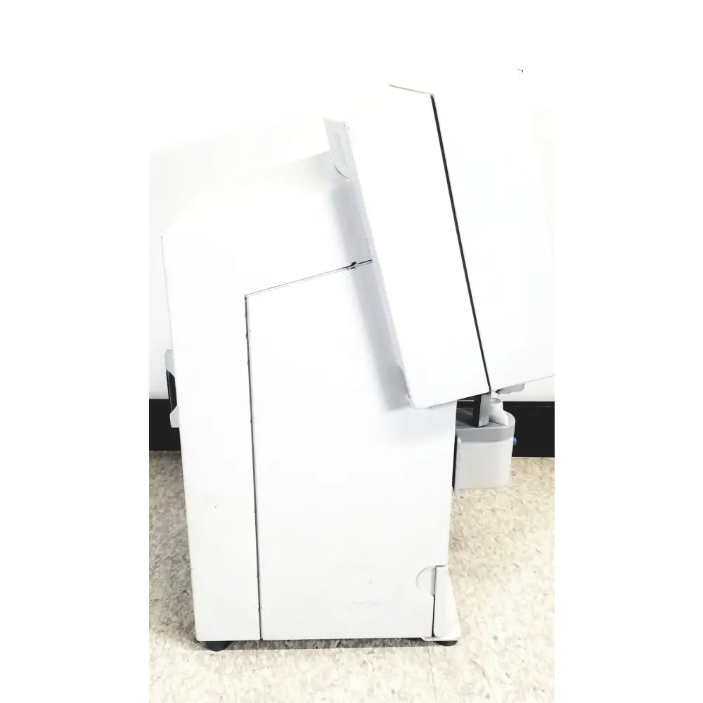 White humphery instruments 350 lens analyzer with angled lid and black caster wheels for reuse medical applications