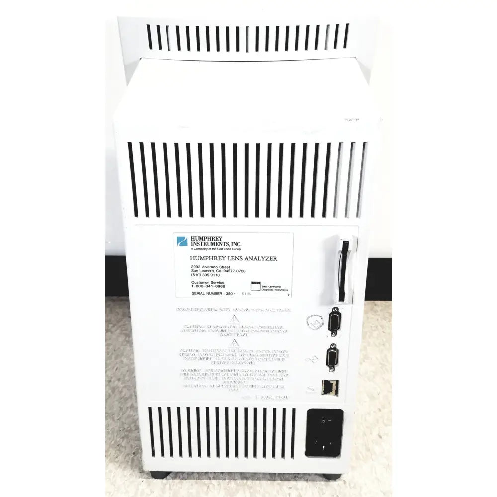 White humphery instruments 350 lens analyzer displaying precision reuse medical equipment for optical analysis