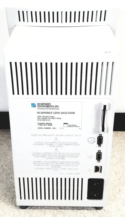 White humphery instruments 350 lens analyzer displaying precision reuse medical equipment for optical analysis