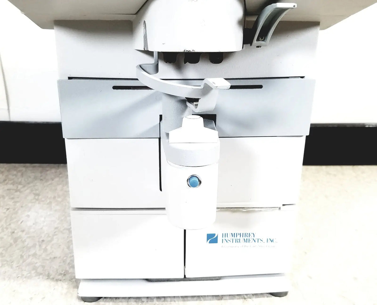 White humphery instruments 350 lens analyzer with blue circular button for reuse medical imaging analysis