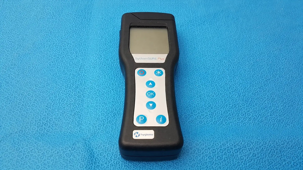 Black handheld hygiena systemsure plus atp monitoring device with rectangular screen and blue circular buttons