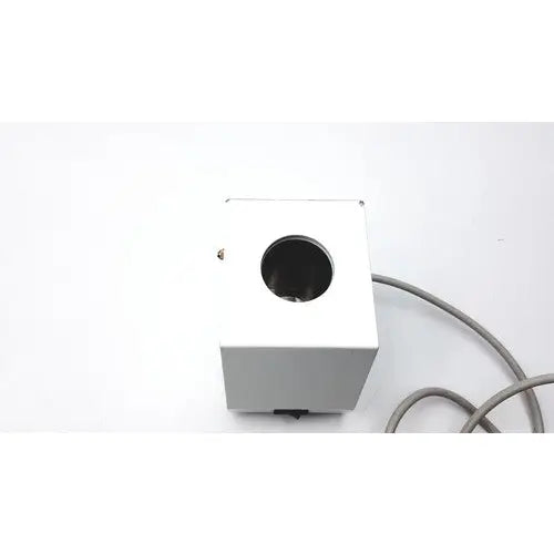 White rectangular ideal products ultrasonic gel heater gw108 with circular opening and gray cable on side