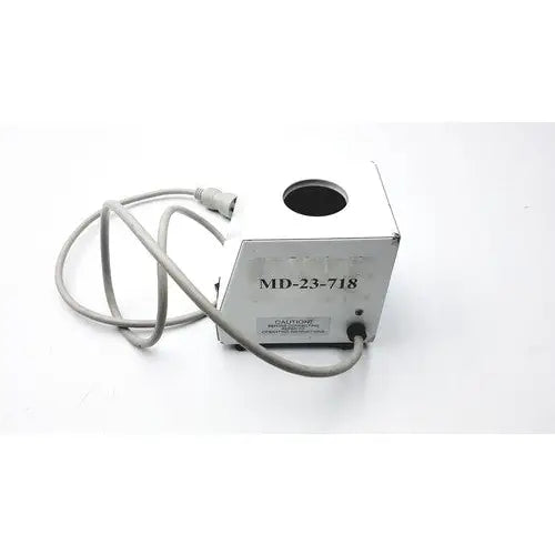 White metal ideal products ultrasonic gel heater with circular opening and label md-23-718 on its side