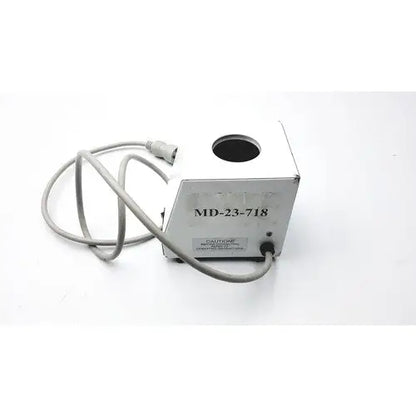 White metal ideal products ultrasonic gel heater with circular opening and label md-23-718 on its side