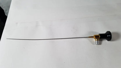 Black-handled imagyn microlap ml-gold cystoscope with slender metallic shaft and gold-toned joint for medical use