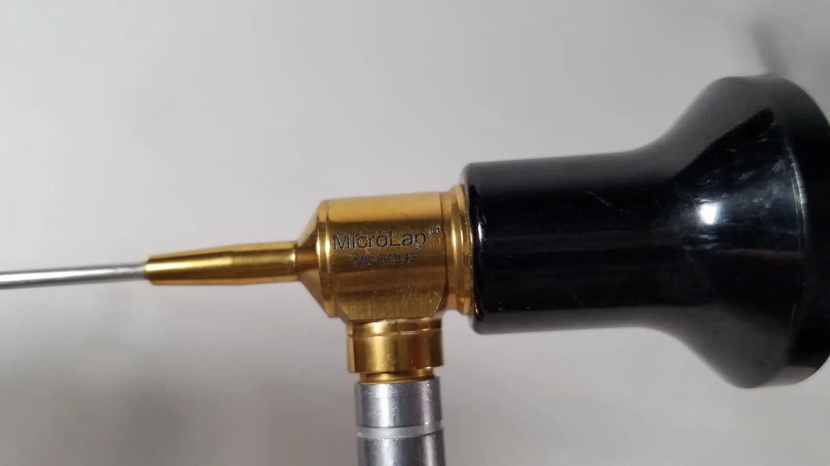 Black and gold imagyn microlap ml-gold cystoscope with metallic probe for precise endoscopic examination