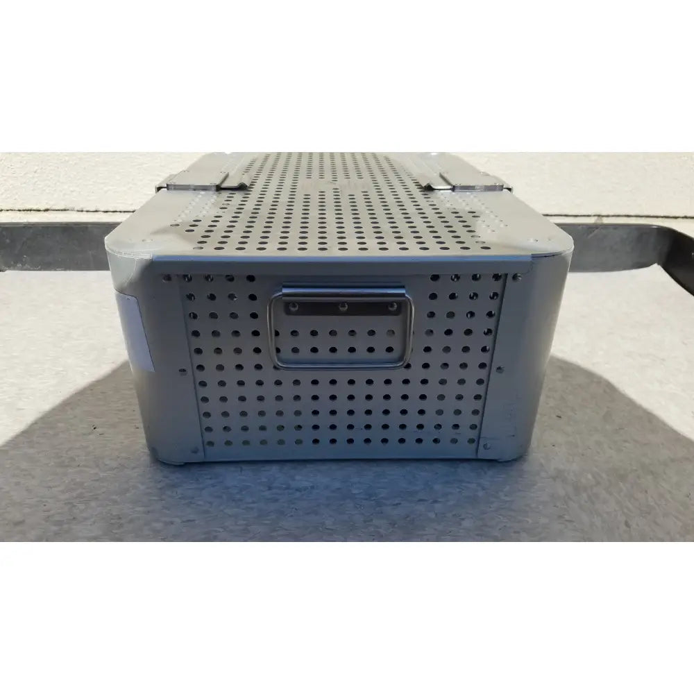 Gray perforated metal case with rectangular handle and reinforced corners for imp innovative medical mayo knee positioner tray
