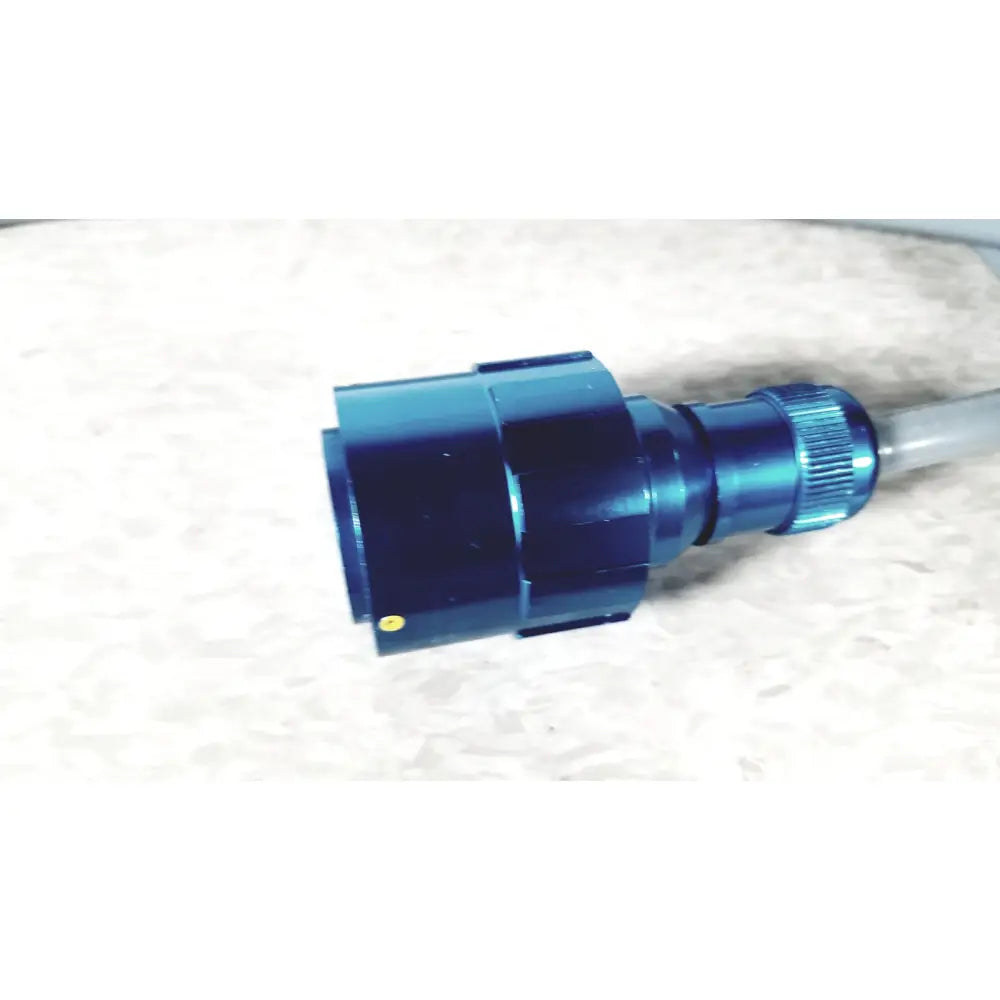 Blue metallic connector with threaded knob and yellow dot on integra cusa excel 36 khz clarity handpiece ultrasonic device