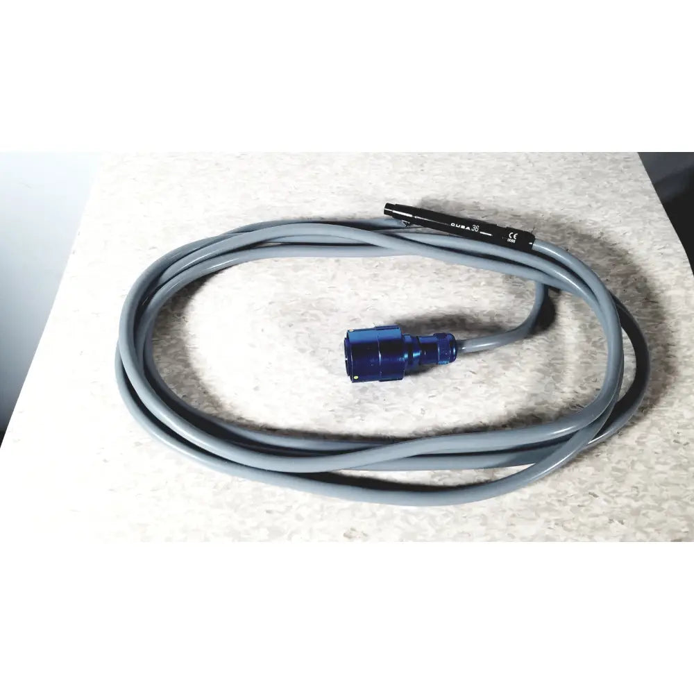 Gray coiled cable with blue metallic connector and black end cap labeled cube 20 for integra cusa excel khz clarity handpiece