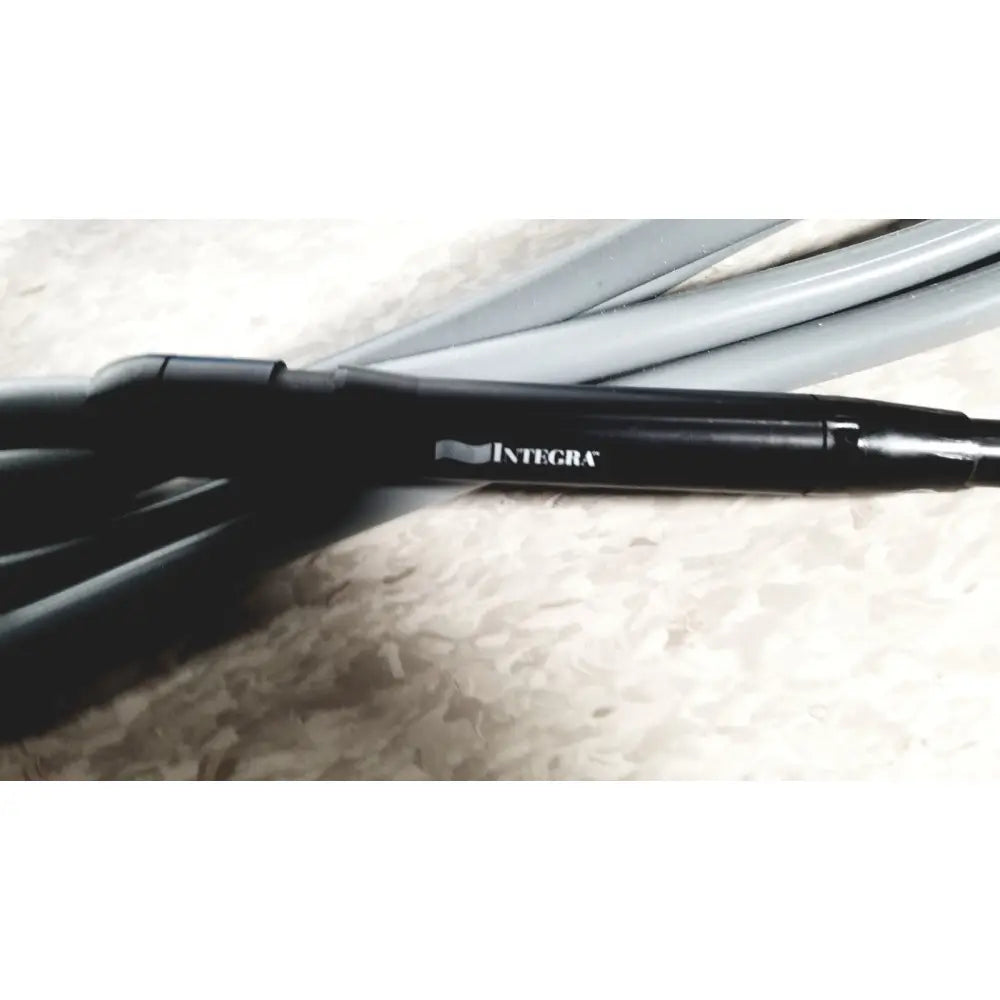 Black integra cusa excel cable with matte finish and segmented design for clarity handpiece ultrasonic surgical system