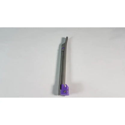 Purple and silver intubrite miller laryngoscope blade with sleek elongated stainless steel handle for surgical use