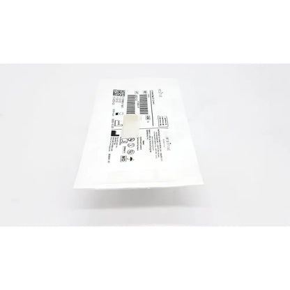 White plastic packaging of intuitive da vinci xi universal seal 5-12mm with printed barcode and labeling information back side