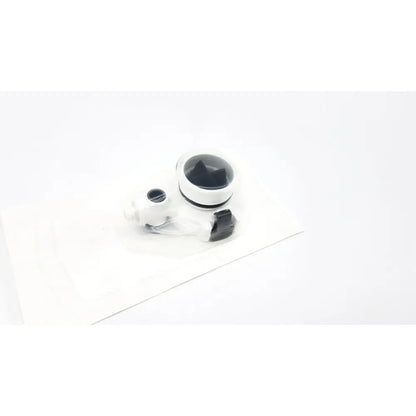 White and black circular camera lens assembly in clear plastic packaging for intuitive da vinci xi universal seal 5-12mm