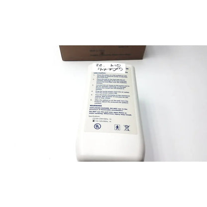 White instruction label with black text and handwritten note on the back of invacare alternating pressure pump cg9701 air mattress