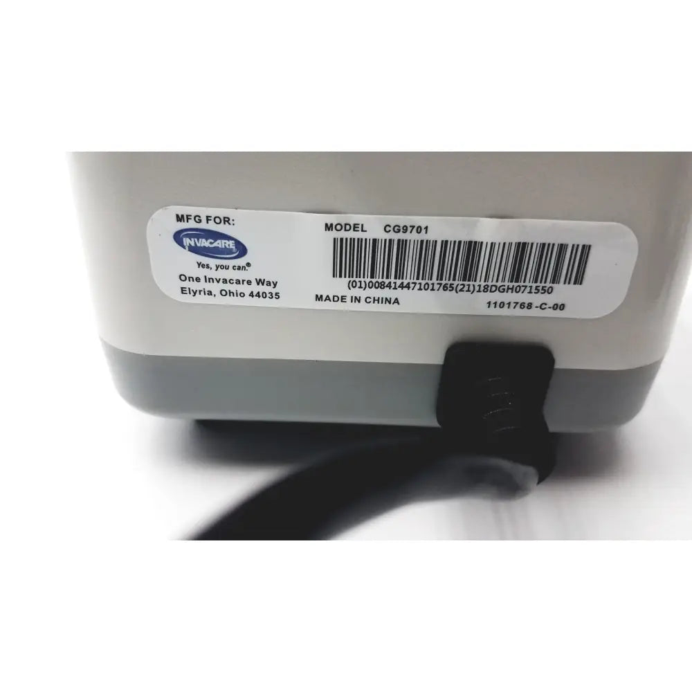 White and gray invacare alternating pressure pump cg9701 with black power cord for air mattresses