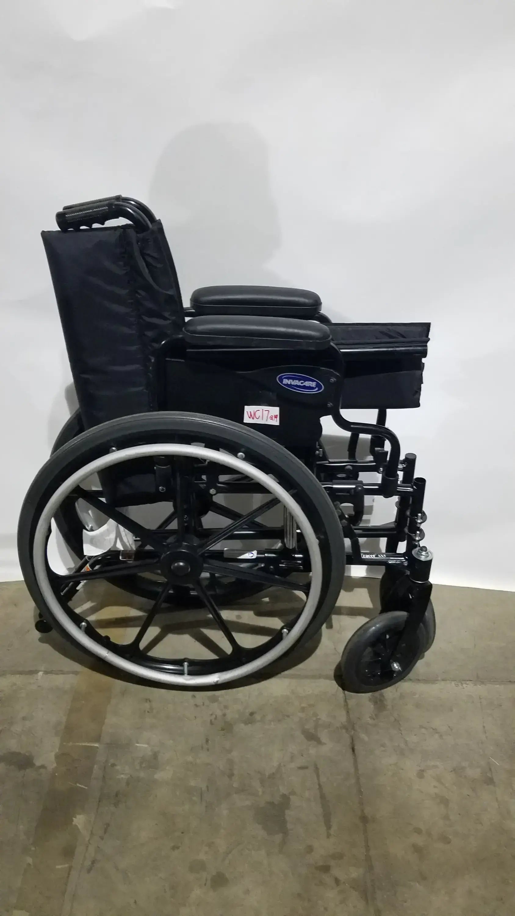 Reuse Medical Equipment Invacare Tracer SX5 Folding Wheelchair – Black Finish with Padded Arm Supports Wheelchairs, second-hand product photo 1