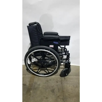 Reuse Medical Equipment Invacare Tracer SX5 Folding Wheelchair – Black Finish with Padded Arm Supports Wheelchairs, second-hand product photo 1